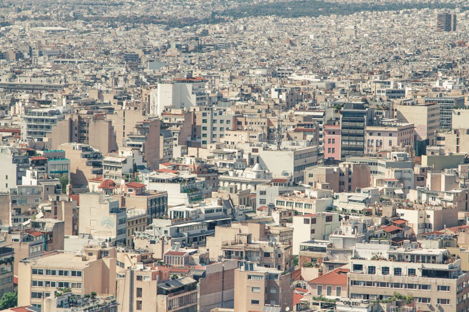 Aerial cityscape of Athens, Greece showcasing dense urban architecture.