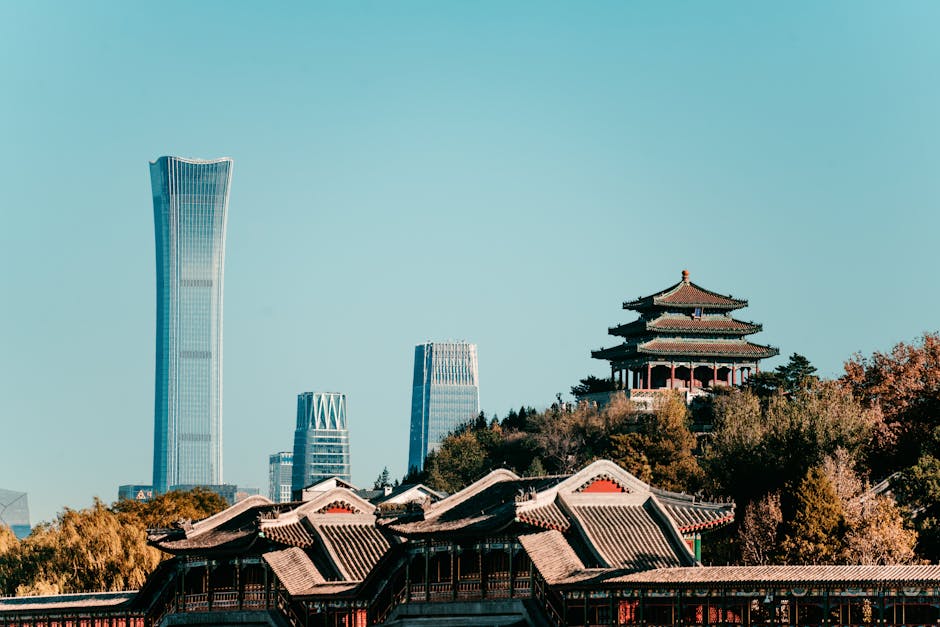 Captivating view of Beijing's skyline featuring traditional architecture and the modern China Zun skyscraper.