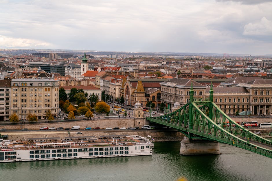 A captivating view of Budapest's Liberty Bridge with historical architecture and urban charm.