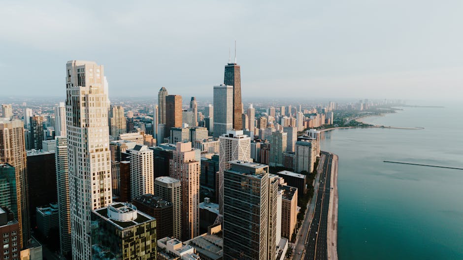 Stunning aerial view of the Chicago skyline along Lake Michigan, showcasing tall skyscrapers and beautiful skyline.