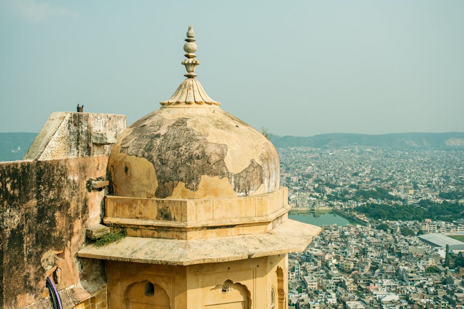 A historic dome in Jaipur offering a panoramic view of the bustling cityscape.