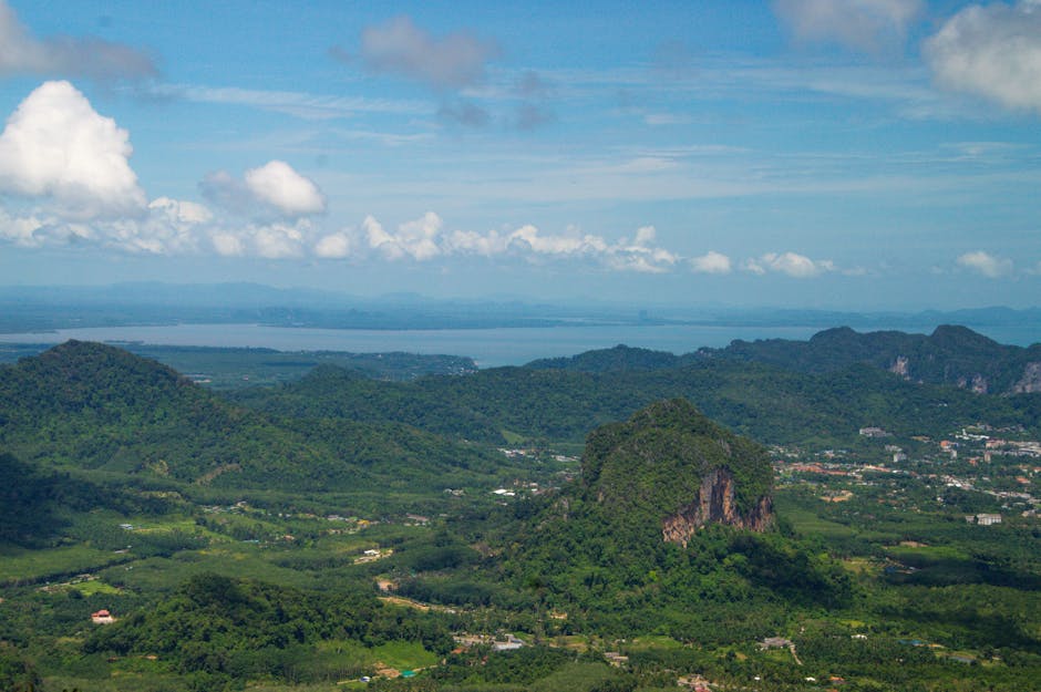 Breathtaking aerial view of Krabi, Thailand featuring lush mountains and coastline.