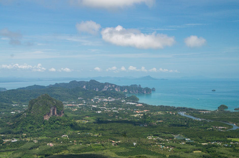 Stunning aerial view of Krabi, Thailand featuring lush greenery and turquoise waters.