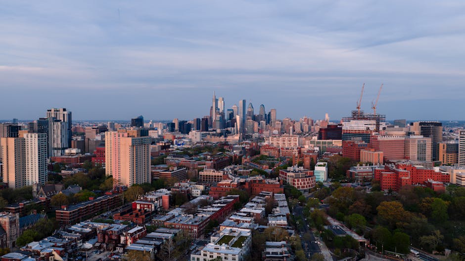 A stunning aerial view showcasing Philadelphia's skyline and urban landscape at dusk.