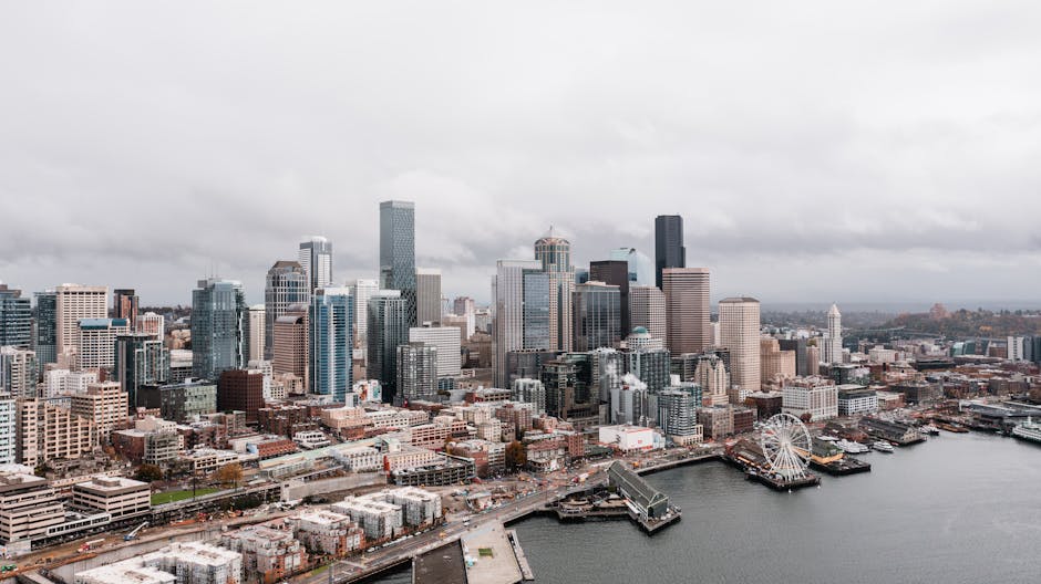 Aerial view of Seattle's downtown skyline featuring iconic skyscrapers and waterfront.
