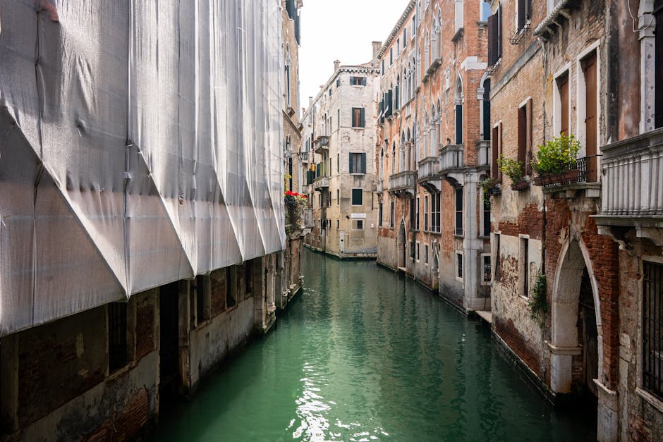 Explore the scenic charm of Venice's historic canals lined with classic architecture.