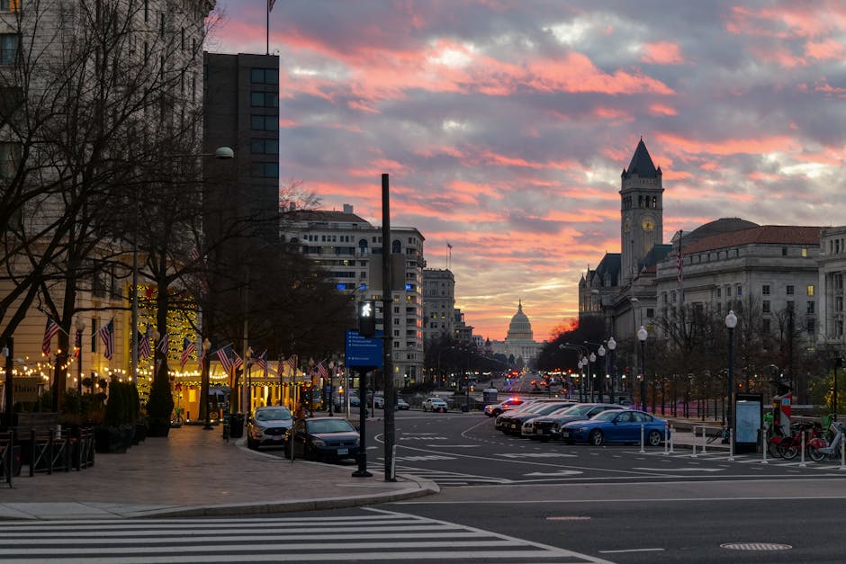 Stunning sunset view of Washington DC cityscape with the Capitol building in the distance.